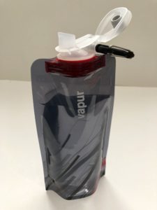 Vapur water bottle filled with water standing