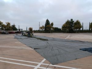 a large tarp is laid out to protect the balloon